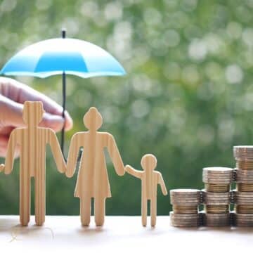 Escala de uma família e moedas relacionadas ao orçamento familiar